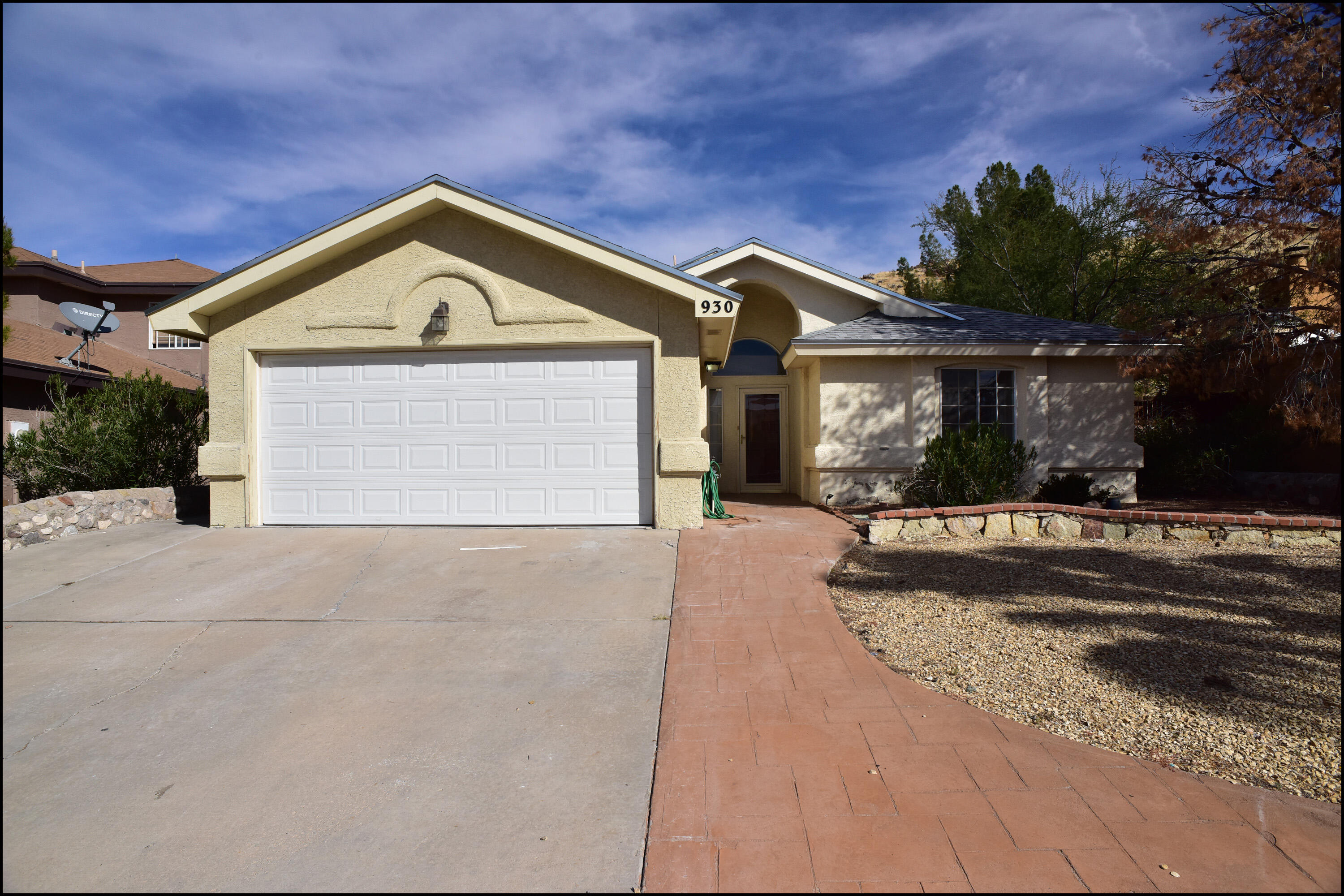 930 Totonaca Lane El Paso, TX 79912 - Photo 1 of 1 a front view of a house with a yard