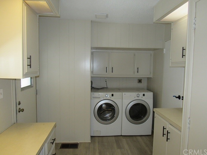 601 North Kirby Street, Unit 557 Hemet, CA 92545 - Photo 13 of 13 a utility room with dryer and washer