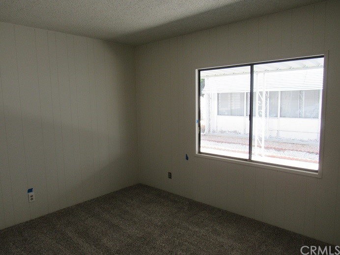 601 North Kirby Street, Unit 557 Hemet, CA 92545 - Photo 10 of 13 an empty room with a window