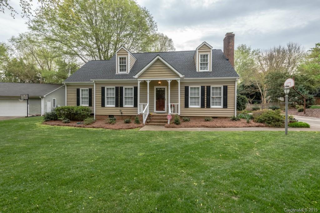 6737 Harrison Road Charlotte, NC 28270 - Photo 1 of 23 a front view of a house with yard and green space