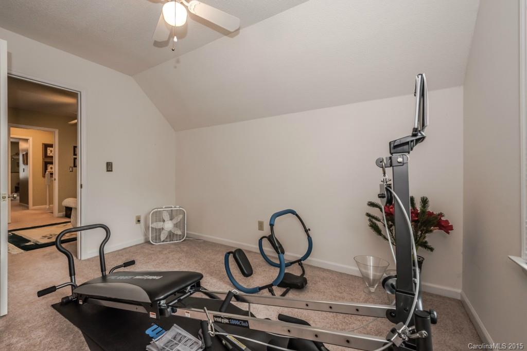 6737 Harrison Road Charlotte, NC 28270 - Photo 15 of 23 a view of a room with gym equipment