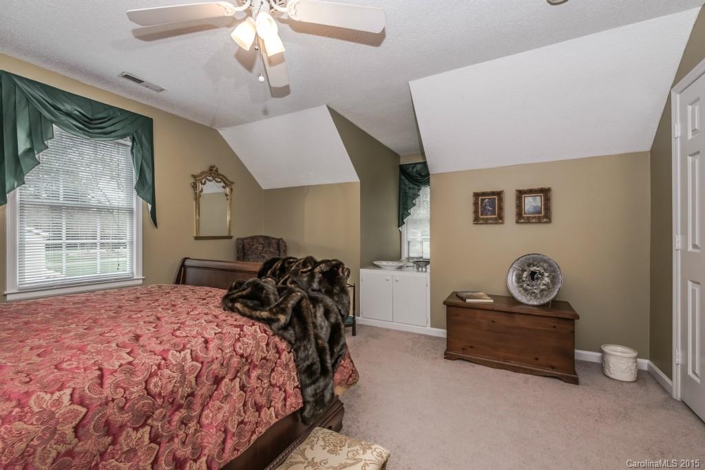 6737 Harrison Road Charlotte, NC 28270 - Photo 17 of 23 a bedroom with a bed and a window