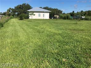 18759 Persimmon Ridge Road Alva, FL 33920 - Photo 5 of 23 a house view with a garden space