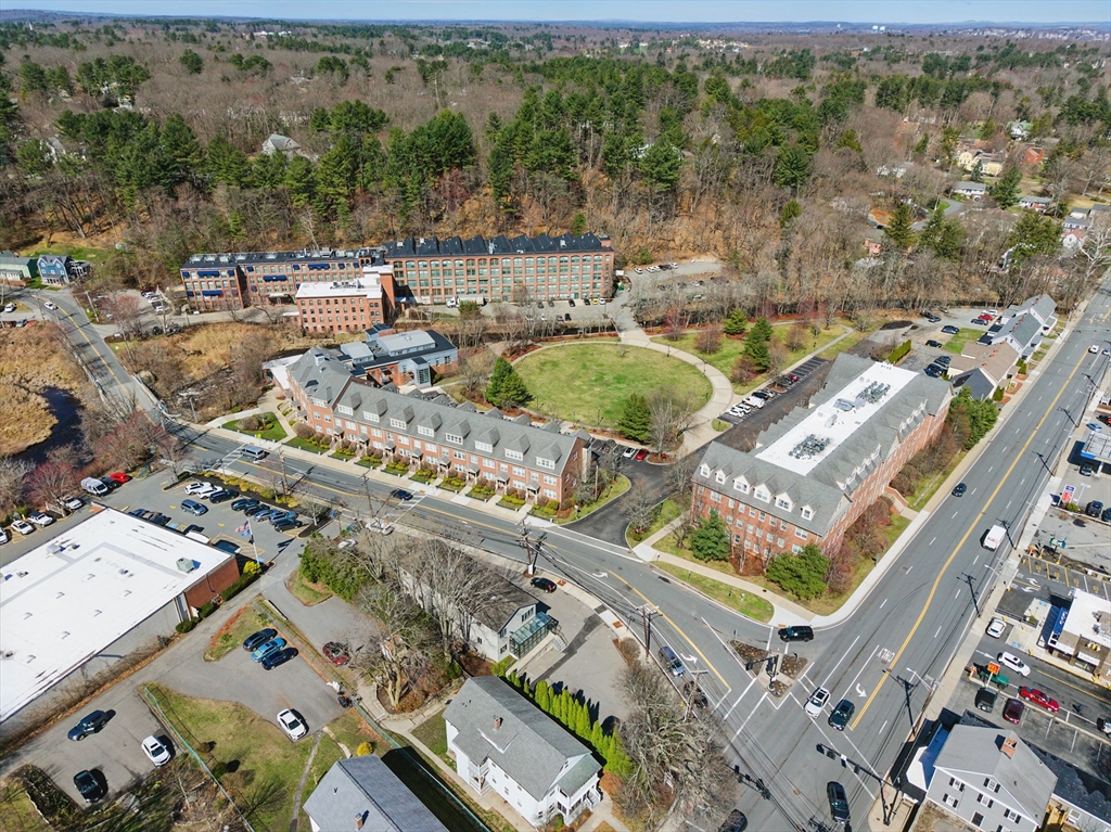 2 Powder Mill Square, Unit 2B Andover, MA 01810 - Photo 31 of 31 an aerial view of a house with a garden