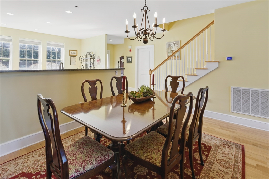 2 Powder Mill Square, Unit 2B Andover, MA 01810 - Photo 8 of 31 a view of a dining room with furniture