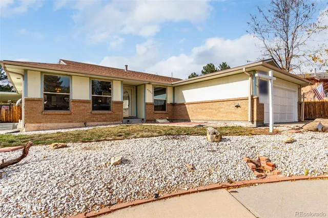 a front view of a house with a patio