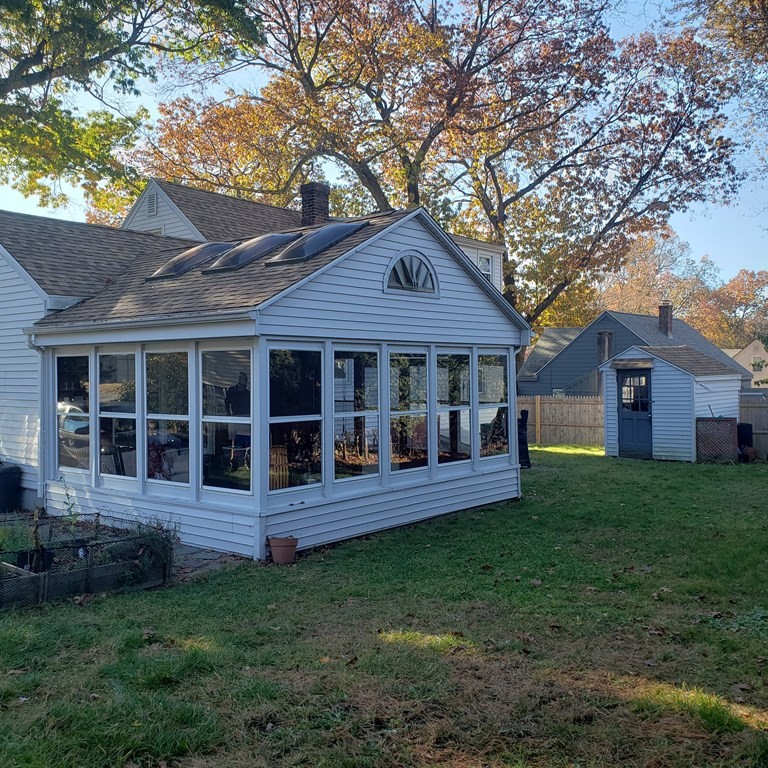 258 Cooper Street Springfield, MA 01108 - Photo 6 of 28 a house view with a garden space