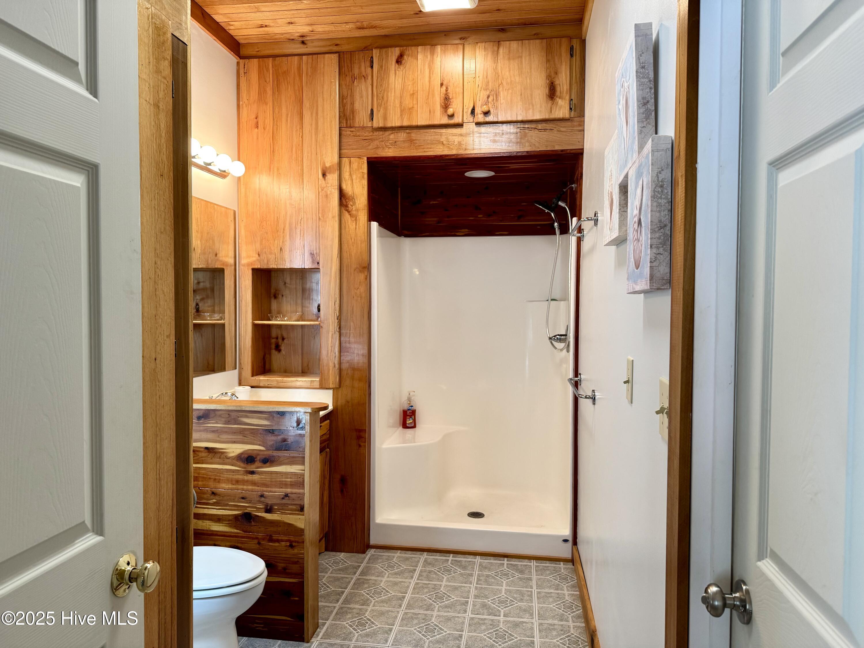 126 Northeast 75th Street, Unit BACK Oak Island, NC 28465 - Photo 6 of 10 IMG_1376