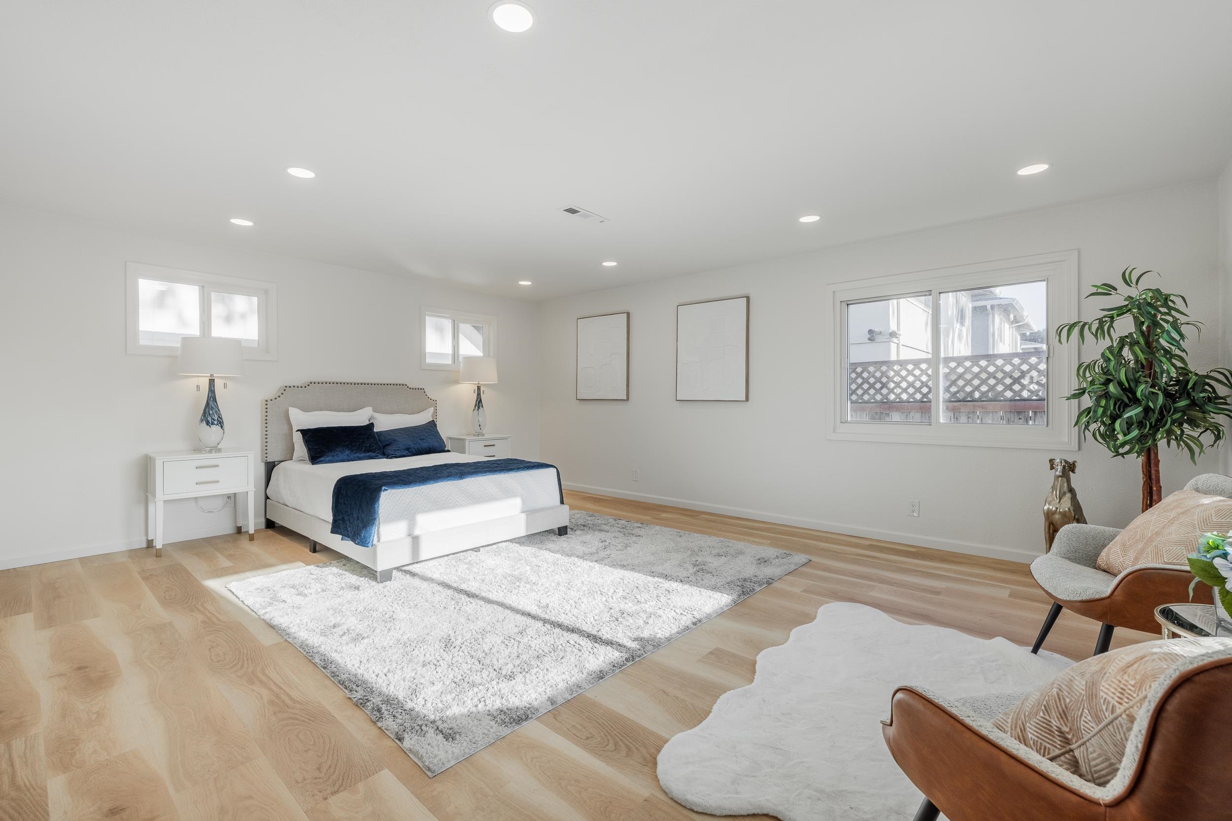 1900 Chestnut Street Santa Clara, CA 95054 - Photo 15 of 39 a living room with furniture and a potted plant