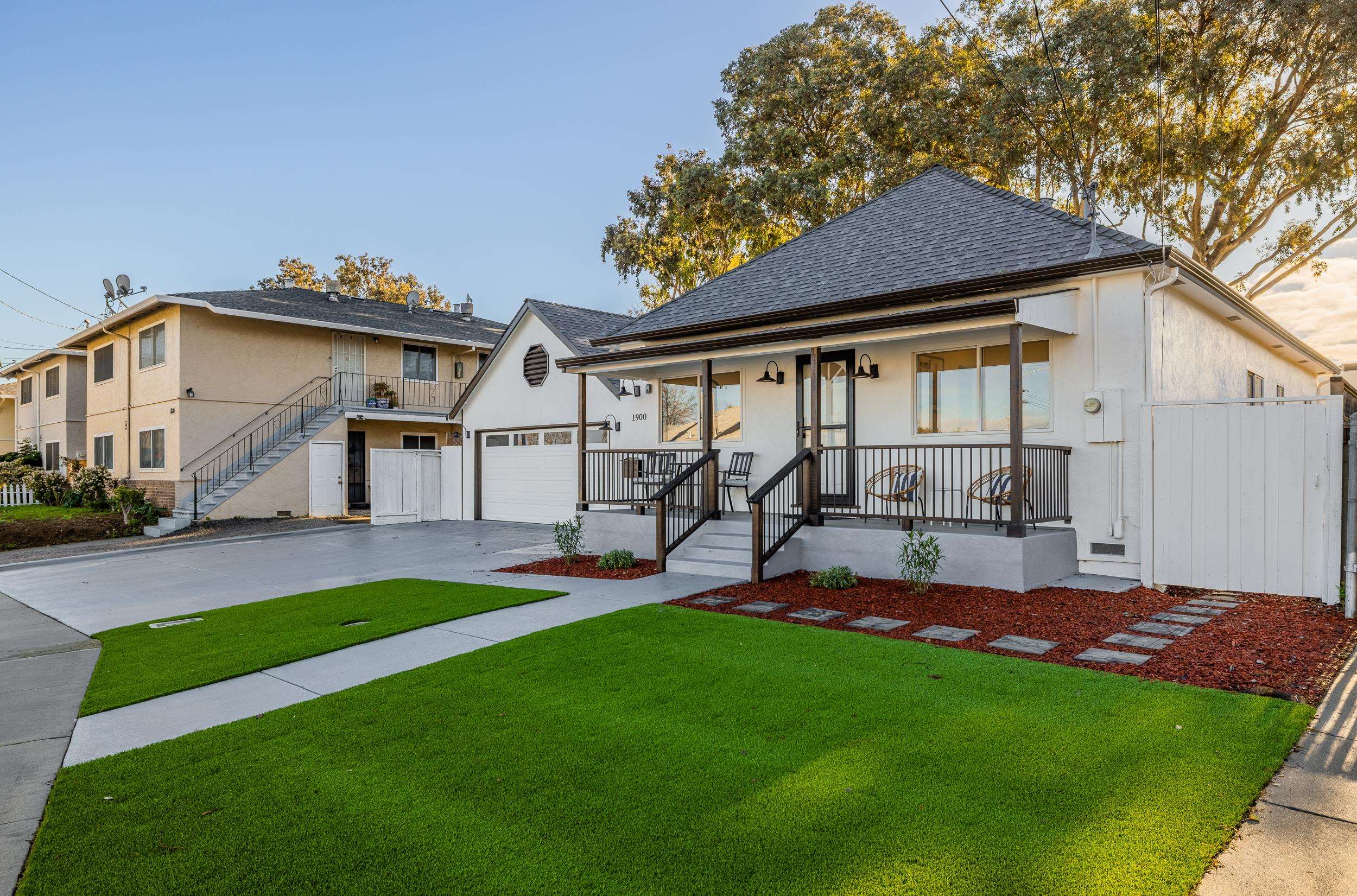 1900 Chestnut Street Santa Clara, CA 95054 - Photo 2 of 39 a view of a house with a yard and sitting area