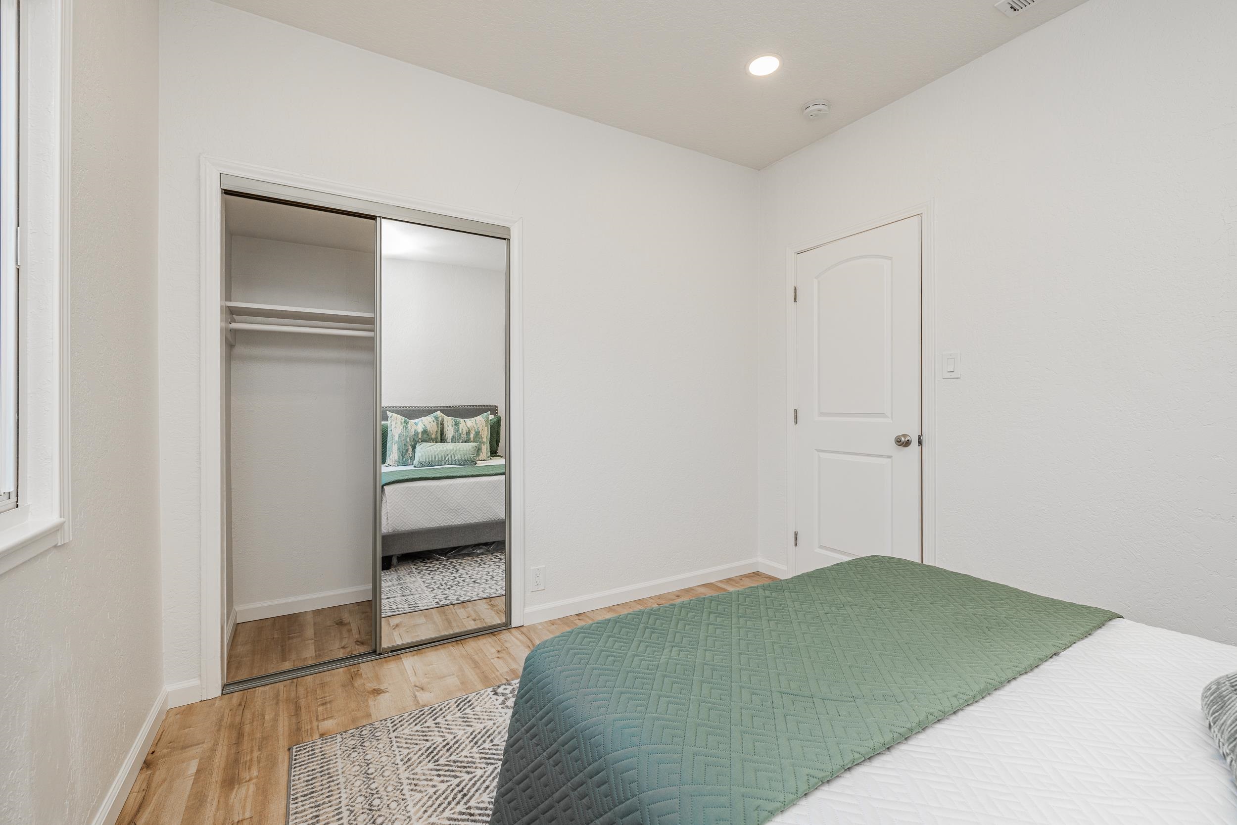 1900 Chestnut Street Santa Clara, CA 95054 - Photo 21 of 39 a bedroom with a bed and a rug