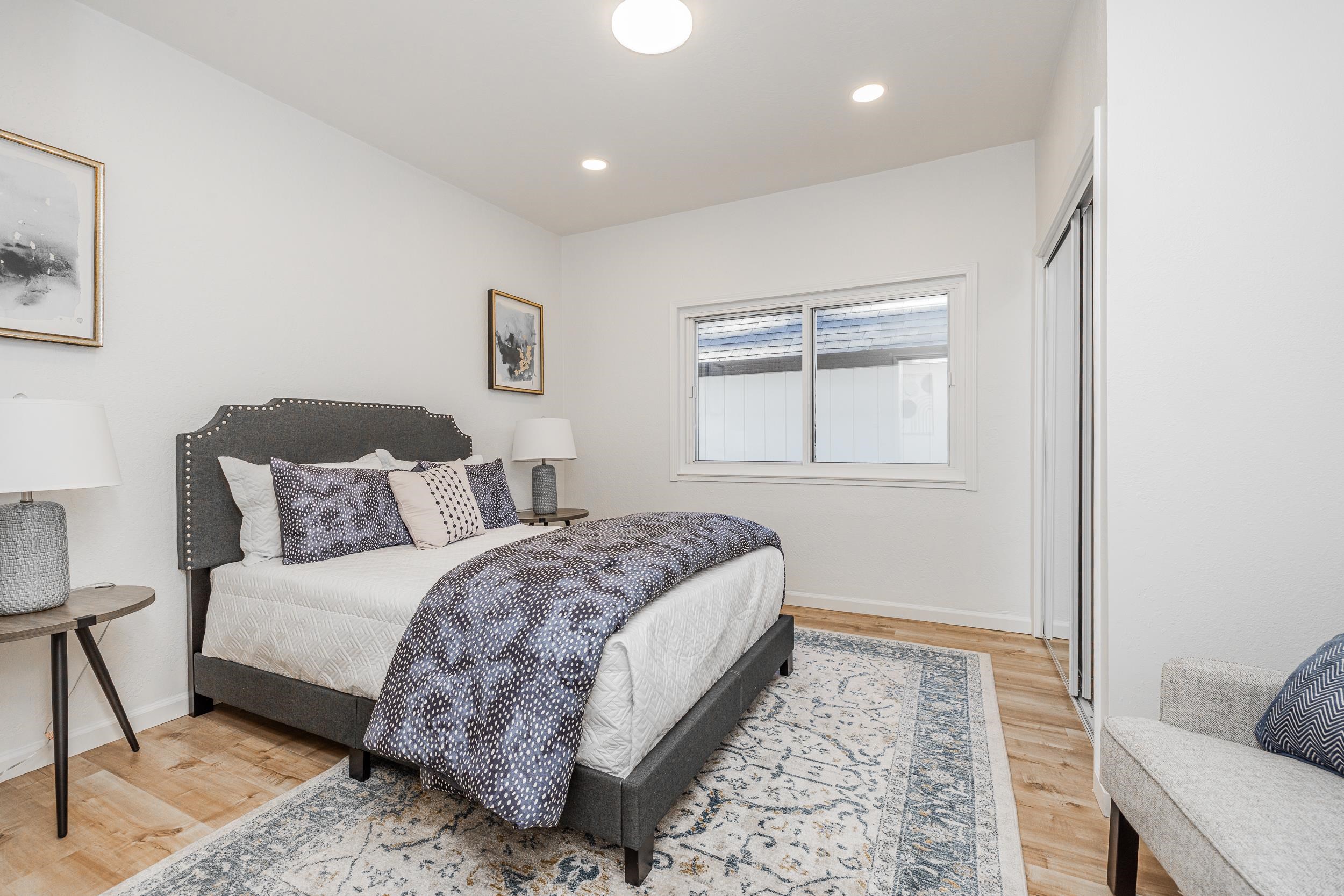 1900 Chestnut Street Santa Clara, CA 95054 - Photo 22 of 39 a bedroom with a bed and a window