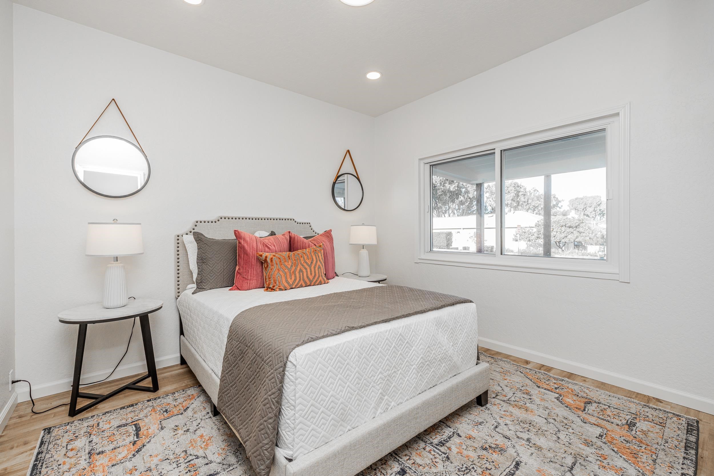 1900 Chestnut Street Santa Clara, CA 95054 - Photo 26 of 39 a bedroom with a bed and wooden floor