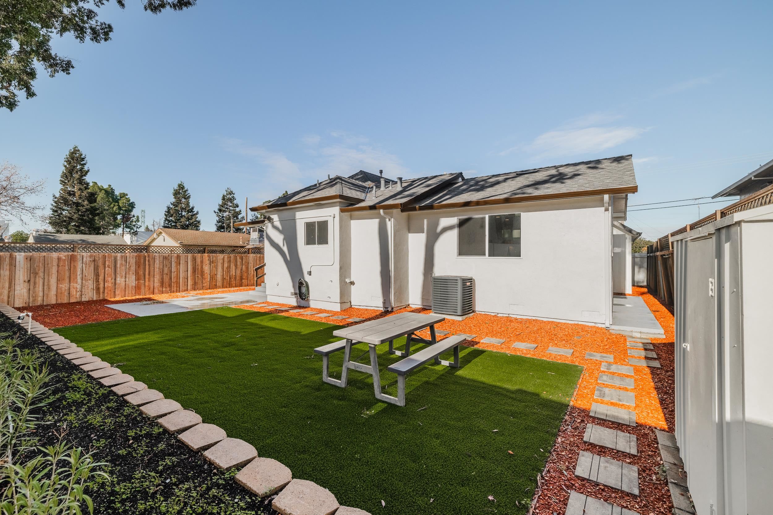 1900 Chestnut Street Santa Clara, CA 95054 - Photo 29 of 39 a backyard of a house with table and chairs