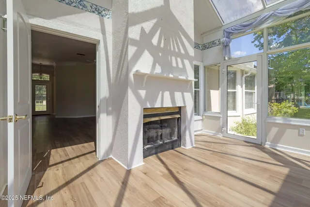 a bedroom with a bed and a fireplace