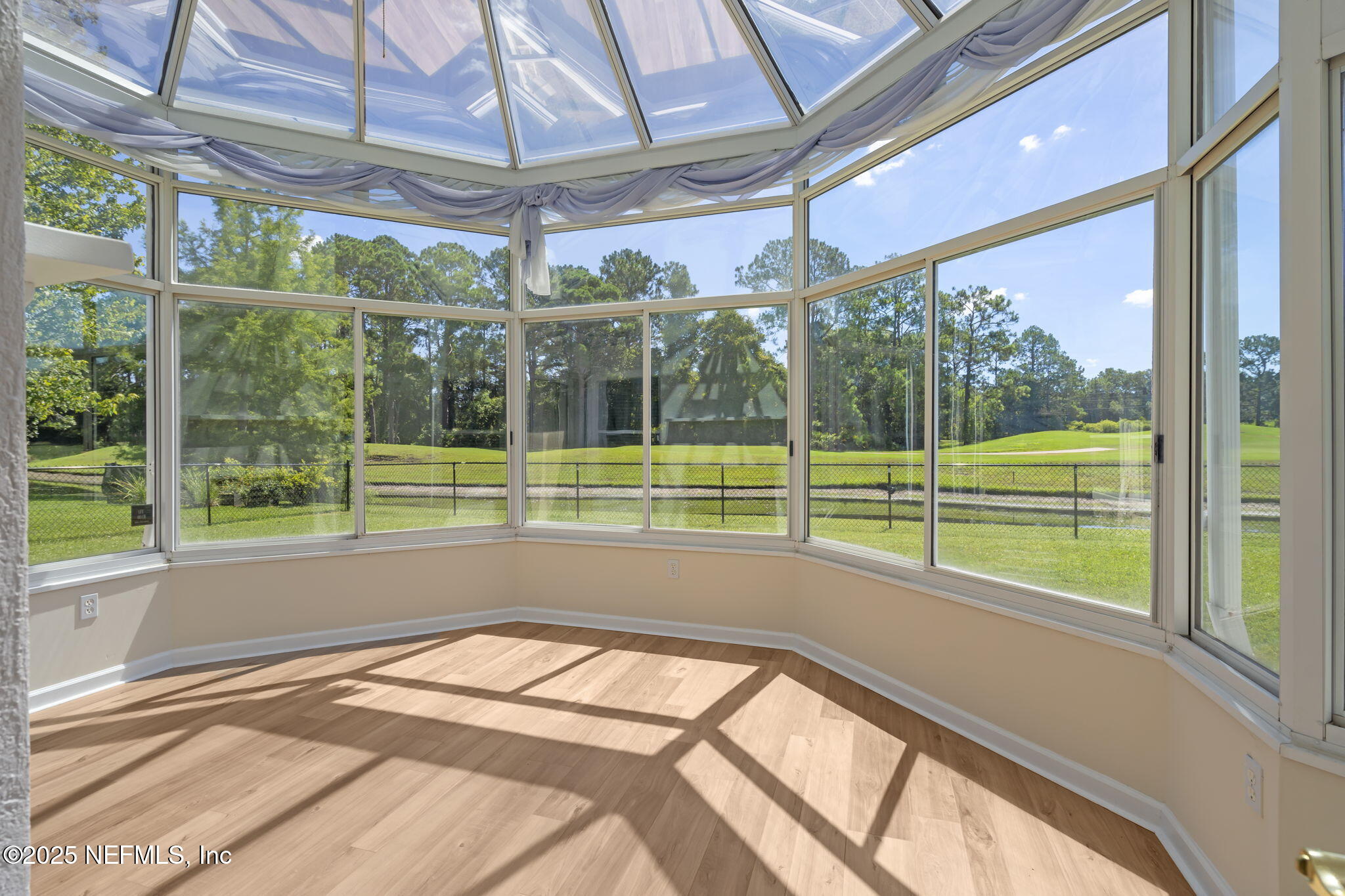 5673 Piper Glen Boulevard Jacksonville, FL 32222 - Photo 16 of 45 a view of a room with a large window