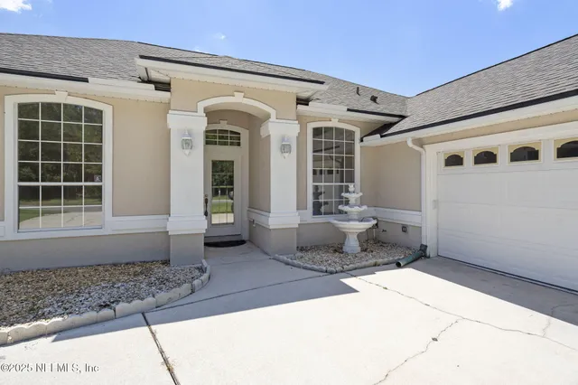 a front view of a house with windows