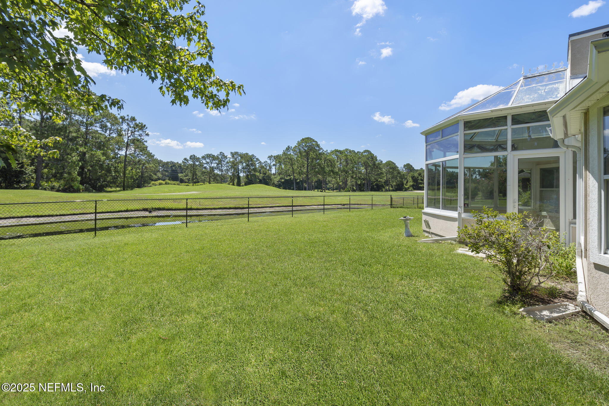 5673 Piper Glen Boulevard Jacksonville, FL 32222 - Photo 32 of 45 a view of a house with a big yard