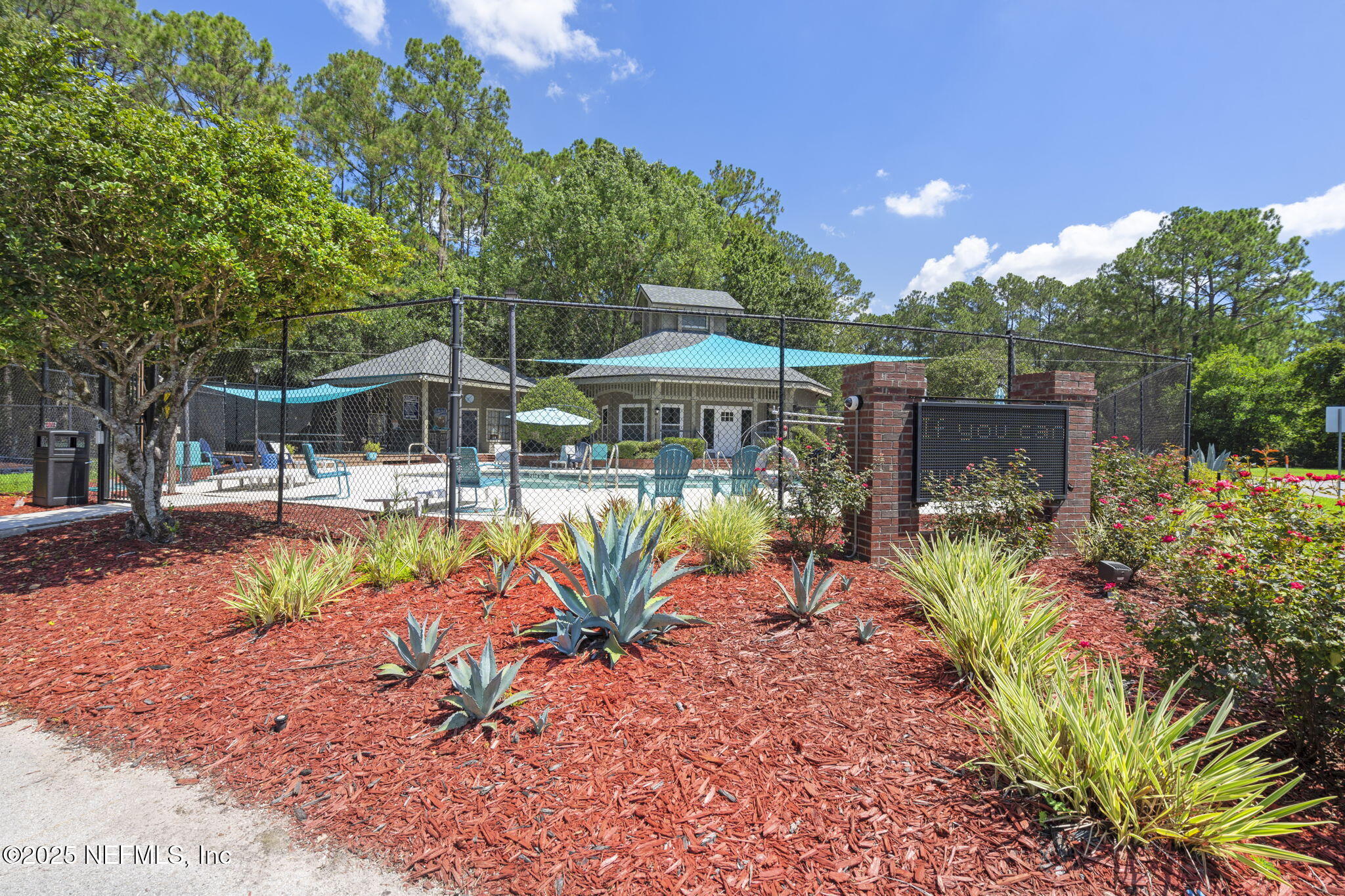 5673 Piper Glen Boulevard Jacksonville, FL 32222 - Photo 40 of 45 a view of a swimming pool with sitting area and furniture