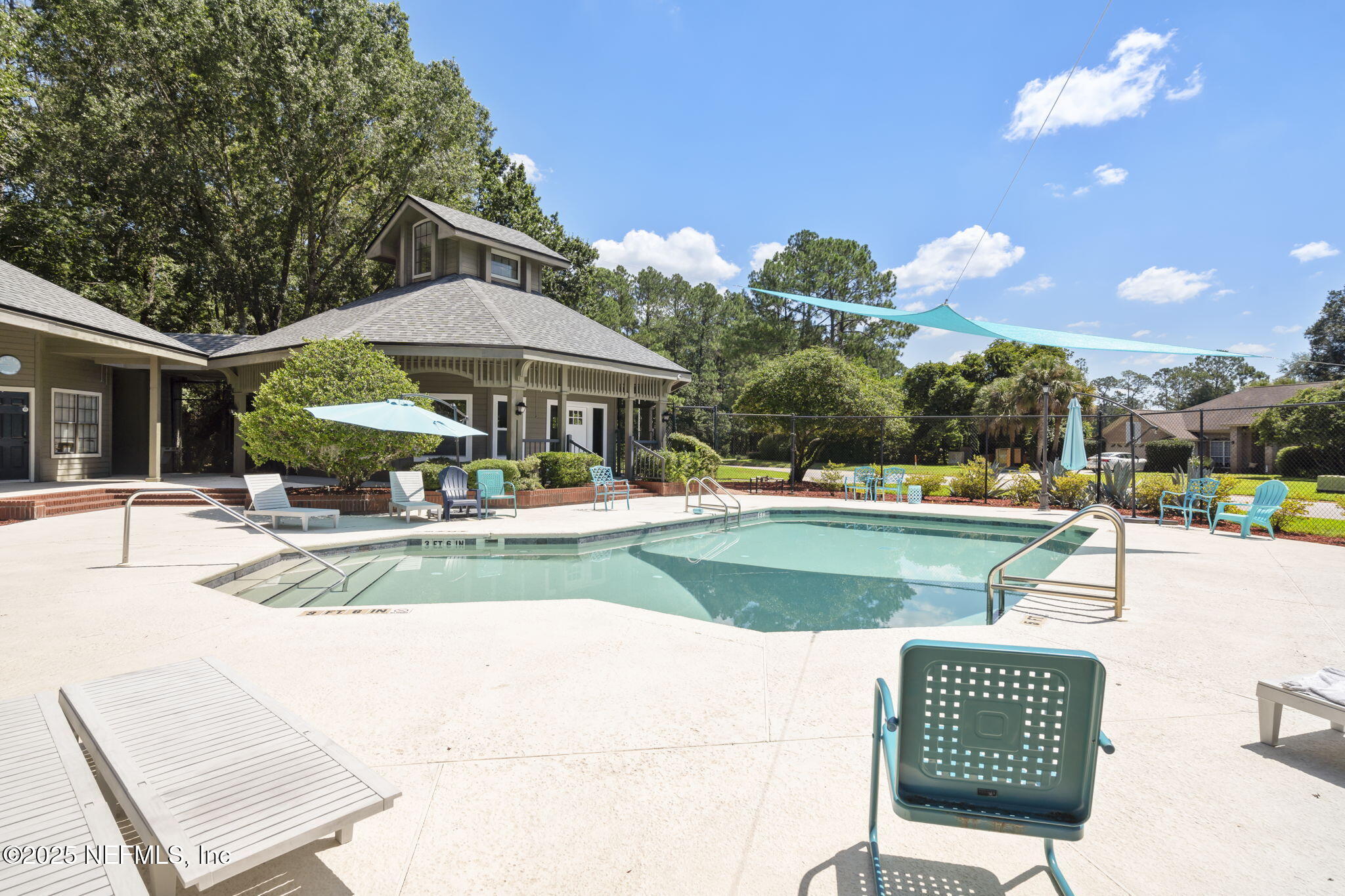 5673 Piper Glen Boulevard Jacksonville, FL 32222 - Photo 41 of 45 a view of a swimming pool with a patio