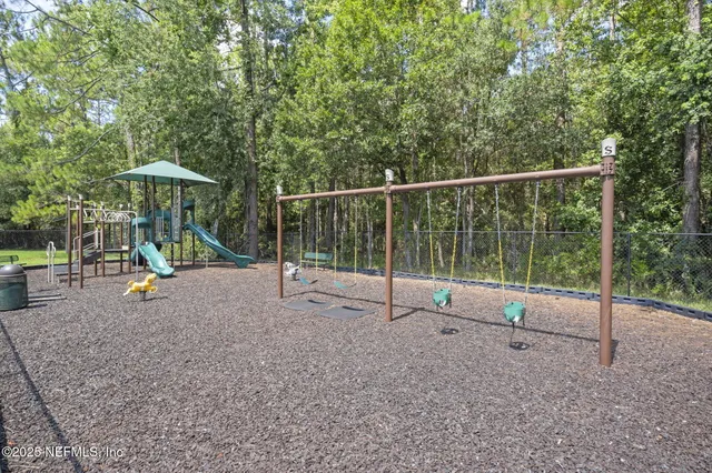 a view of park with swing