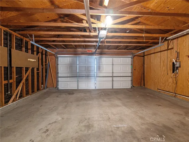 a view of an empty room with stairs