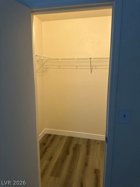 7255 West Sunset Road, Unit 2006 Las Vegas, NV 89113 - Photo 16 of 24 A well-organized closet with ample shelving and polished flooring awaits your belongings.