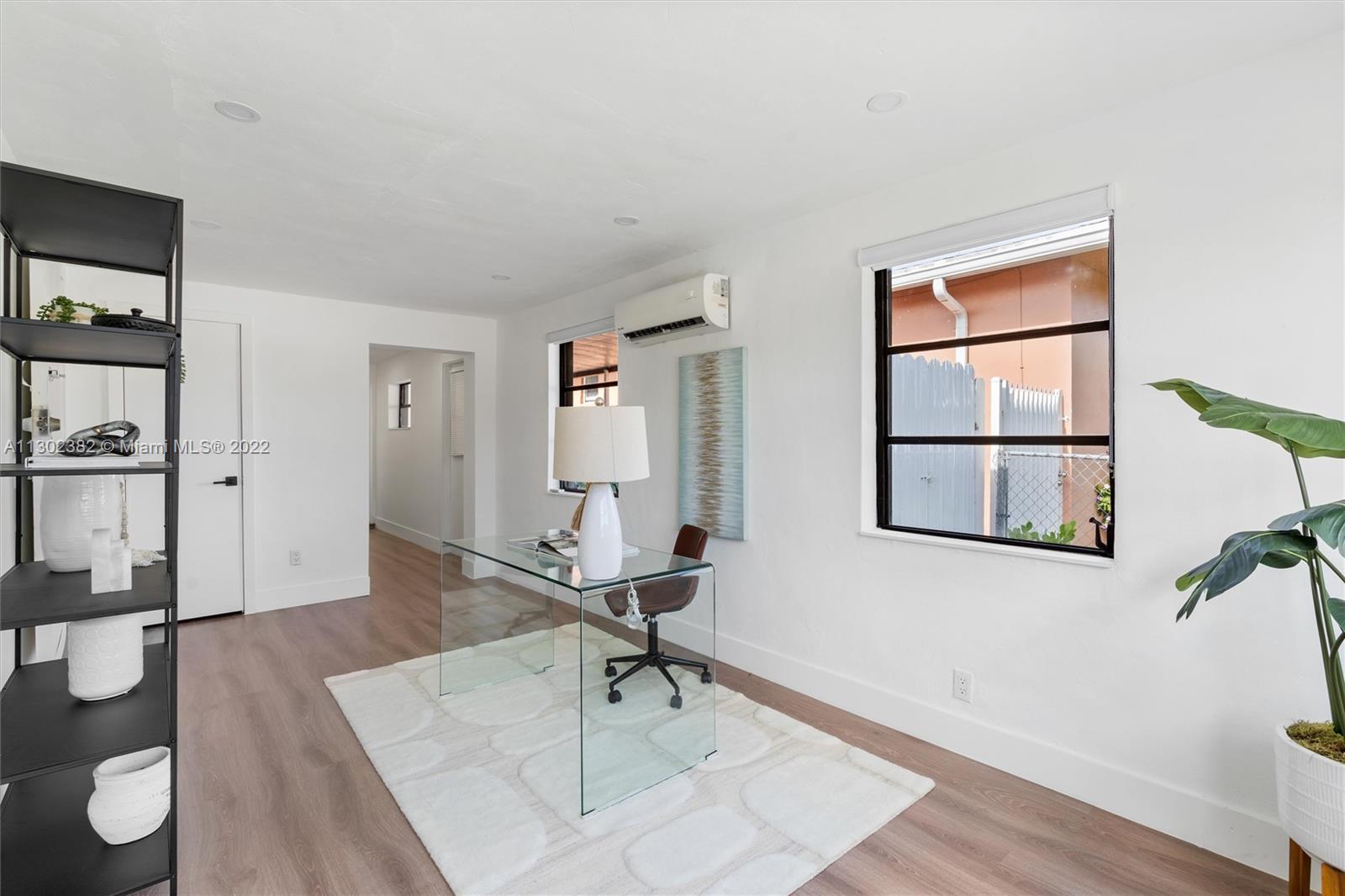 450 Flagami Boulevard Miami, FL 33144 - Photo 10 of 23 a living room with furniture and a window