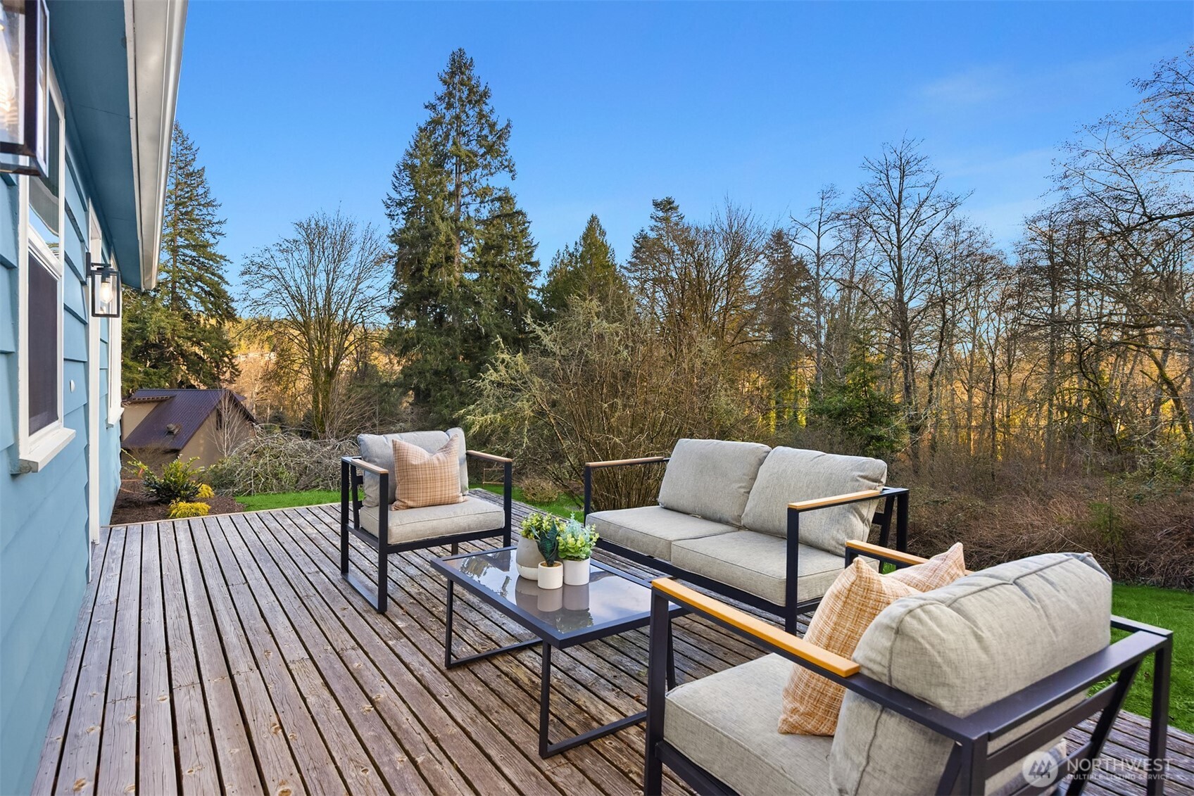 7204 Northeast Baker Hill Road Bainbridge Island, WA 98110 - Photo 26 of 40 a view of sitting area with furniture and wooden floor