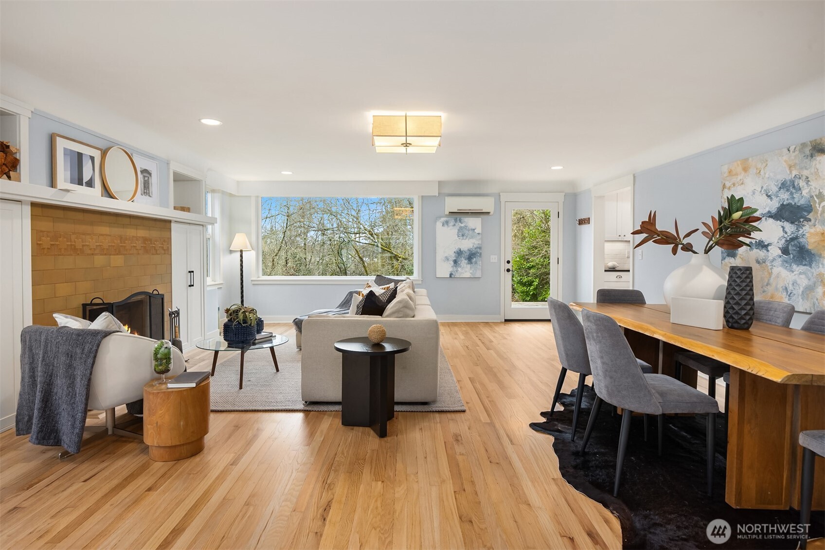 7204 Northeast Baker Hill Road Bainbridge Island, WA 98110 - Photo 9 of 40 a living room with furniture and a wooden floor