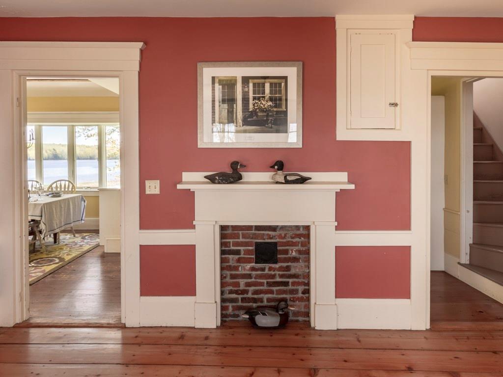 643 Browns Point Road Bowdoinham, ME 04008 - Photo 13 of 32 A formal dining room just off the...