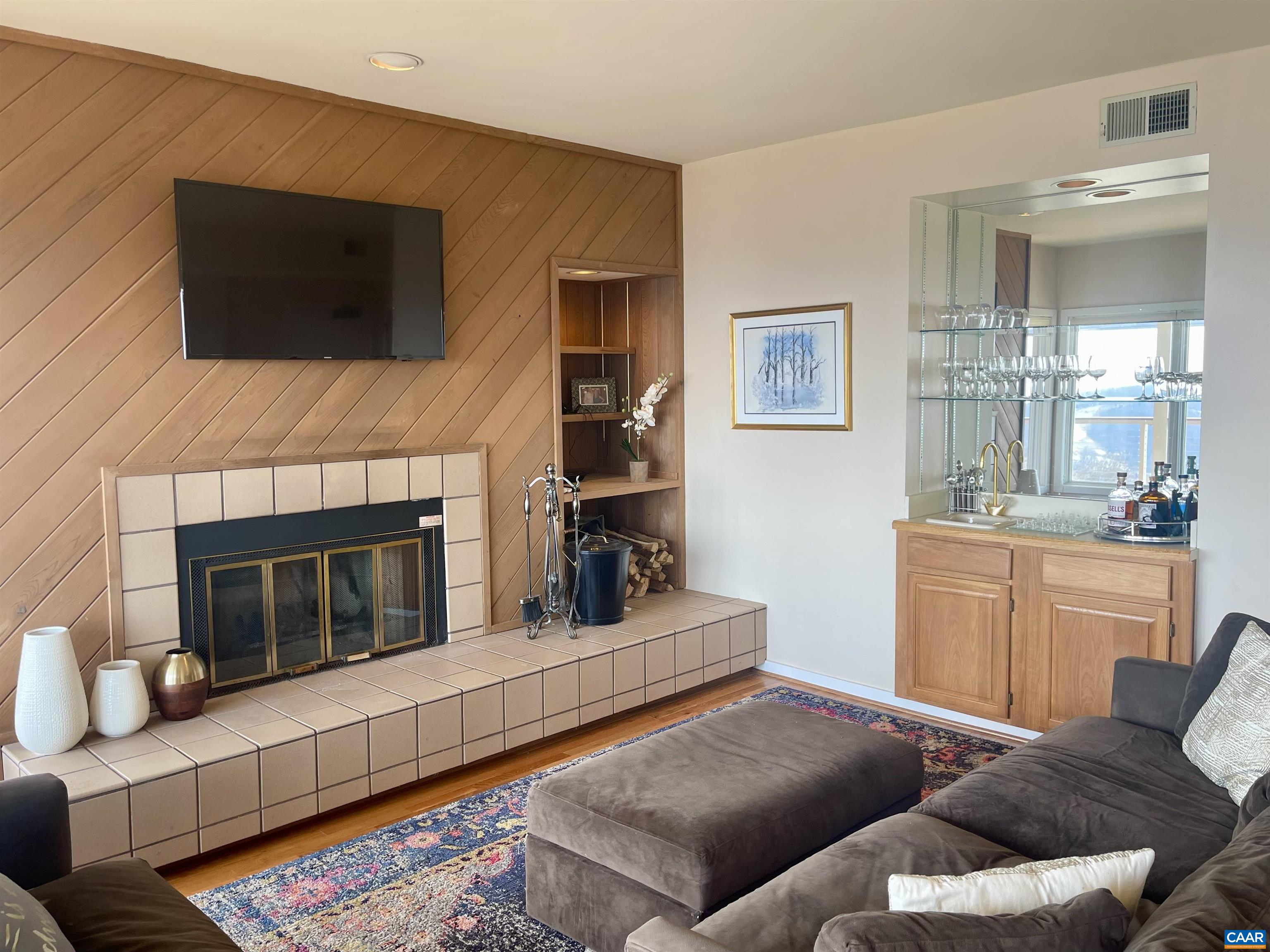 1613 Overlook Condos Roseland, VA 22967 - Photo 12 of 35 a living room with furniture and a flat screen tv