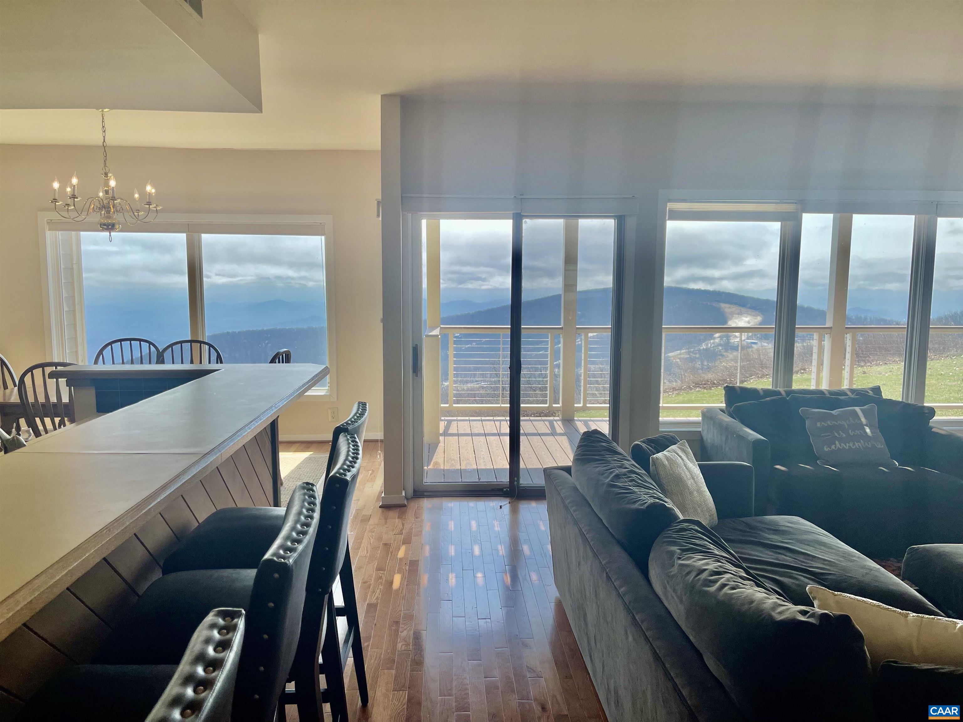 1613 Overlook Condos Roseland, VA 22967 - Photo 3 of 35 a living room with furniture and a large window