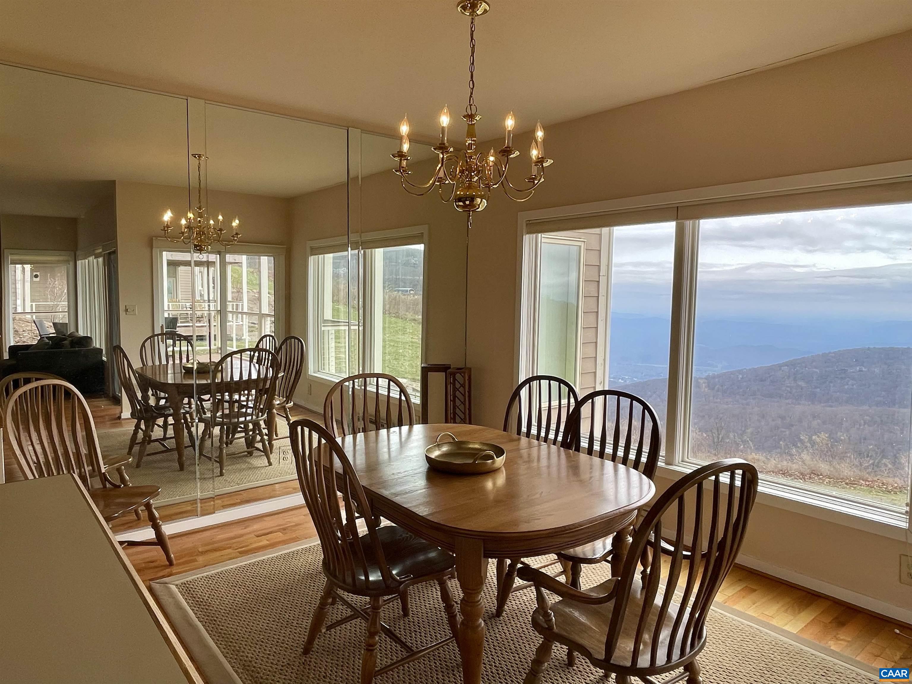 1613 Overlook Condos Roseland, VA 22967 - Photo 4 of 35 a view of a dining room with furniture window and outside view