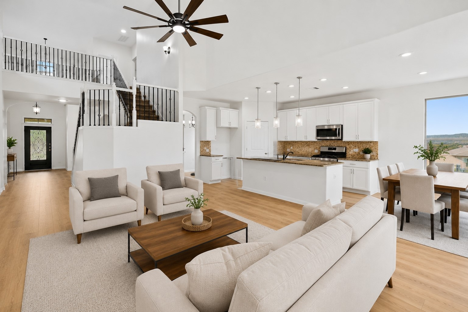 304 Santa Maria Street Georgetown, TX 78628 - Photo 15 of 37 A spacious, open-concept interior featuring high ceilings and a modern kitchen flows into a dedicated dining space. Virtually Staged.
