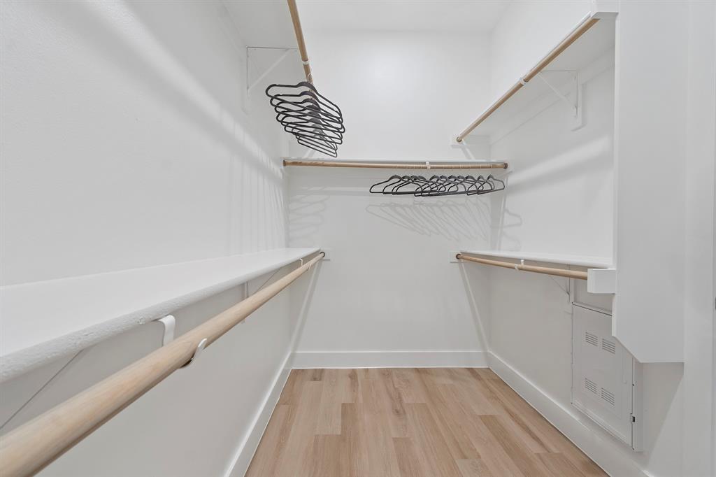 8218 Idyllic Place McKinney, TX 75071 - Photo 18 of 24 a view of small space with racks on the wall