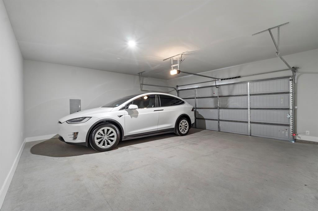 8218 Idyllic Place McKinney, TX 75071 - Photo 3 of 24 a view of a car garage