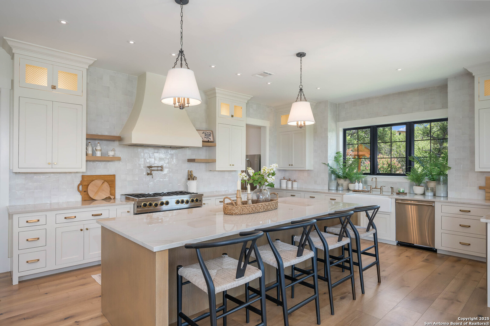 324 Ridge Point Spring Branch, TX 78070 - Photo 14 of 50 a kitchen with a stove a sink and a refrigerator