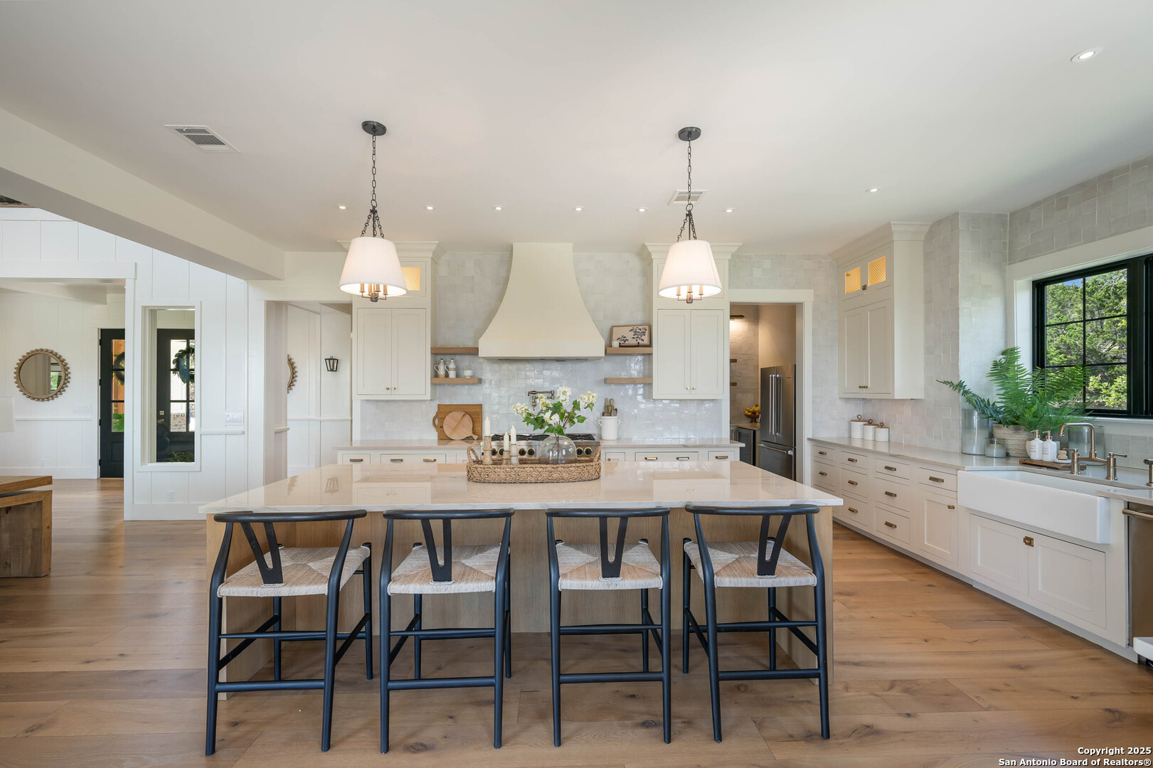 324 Ridge Point Spring Branch, TX 78070 - Photo 16 of 50 a large kitchen with a table and chairs