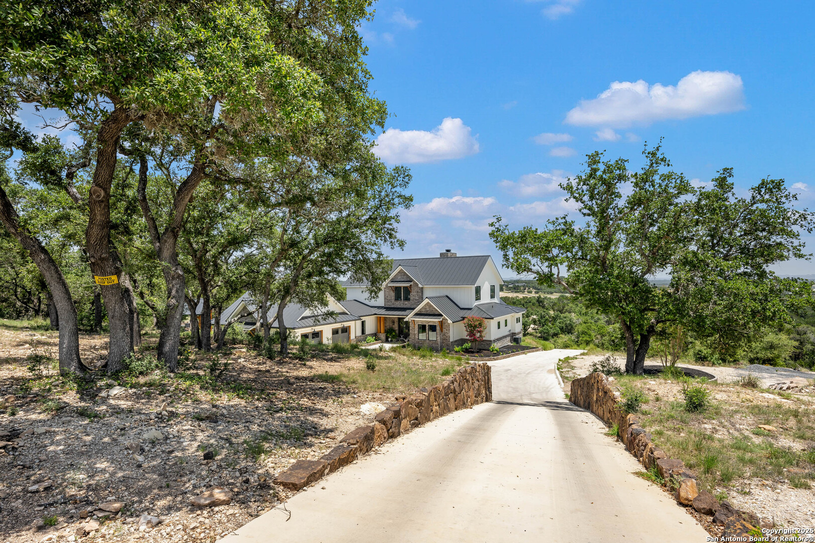 324 Ridge Point Spring Branch, TX 78070 - Photo 2 of 50 a view of a swimming pool with a yard