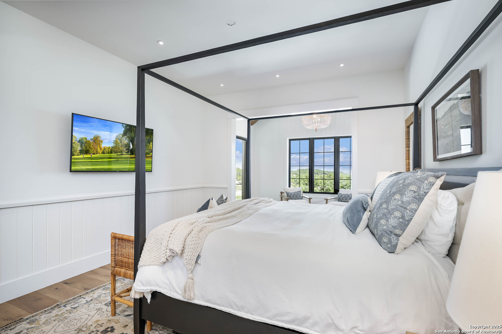 324 Ridge Point Spring Branch, TX 78070 - Photo 33 of 50 a bed sitting in a bedroom next to a window
