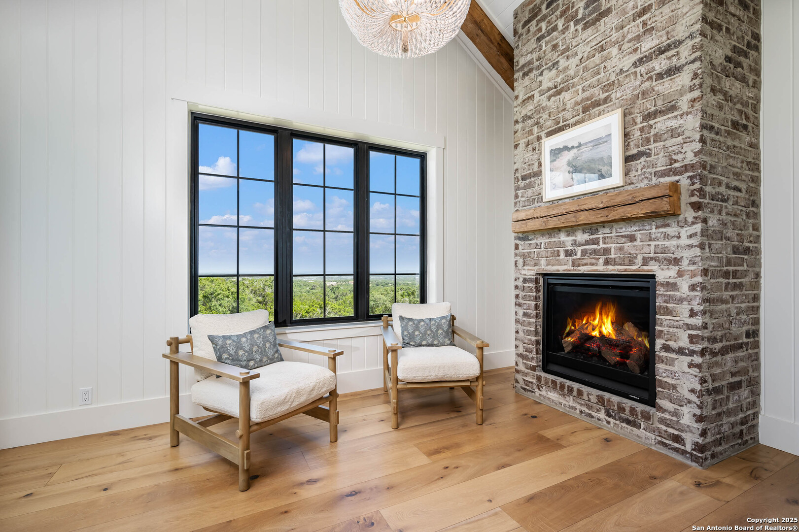 324 Ridge Point Spring Branch, TX 78070 - Photo 34 of 50 a living room with furniture a rug and a fireplace