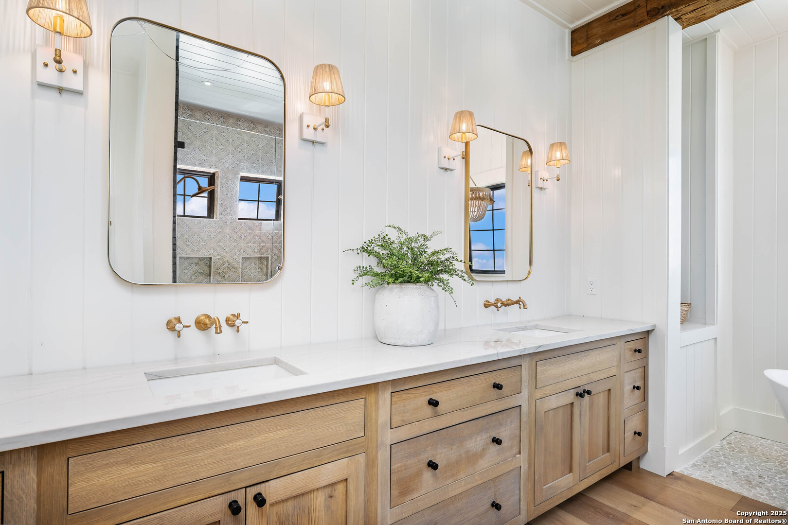 324 Ridge Point Spring Branch, TX 78070 - Photo 36 of 50 a bathroom with cabinets and mirror