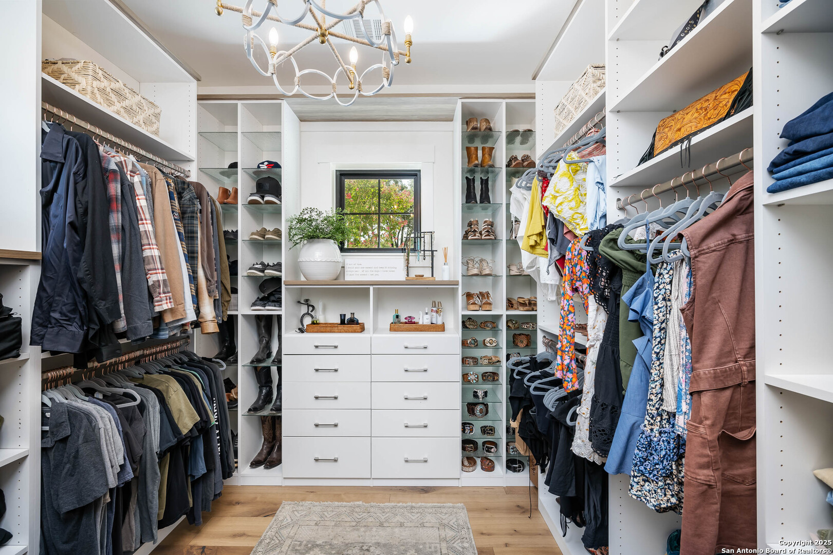 324 Ridge Point Spring Branch, TX 78070 - Photo 41 of 50 a view of walk in closet with clothes and shoes