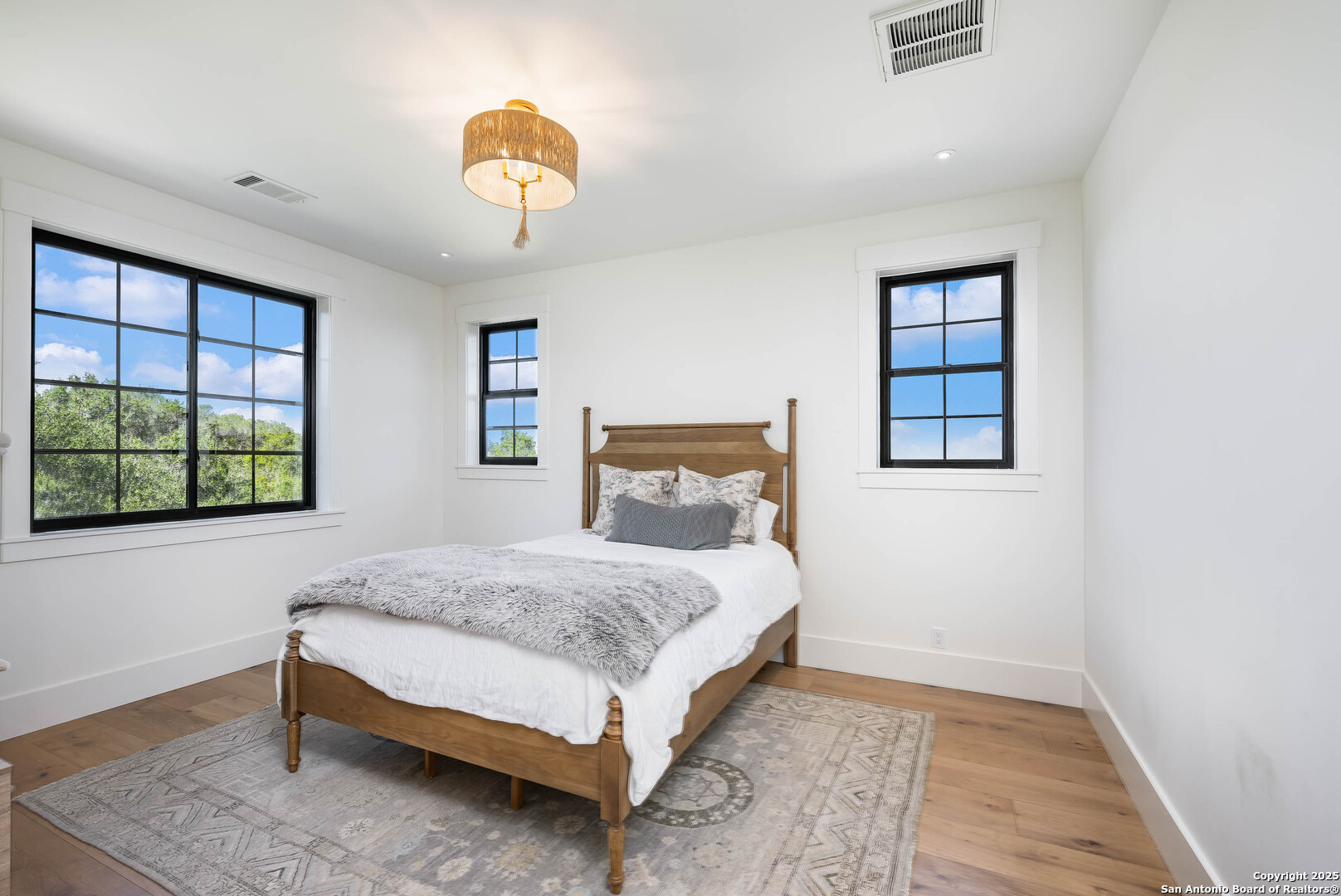 324 Ridge Point Spring Branch, TX 78070 - Photo 42 of 50 a bedroom with a bed and a window