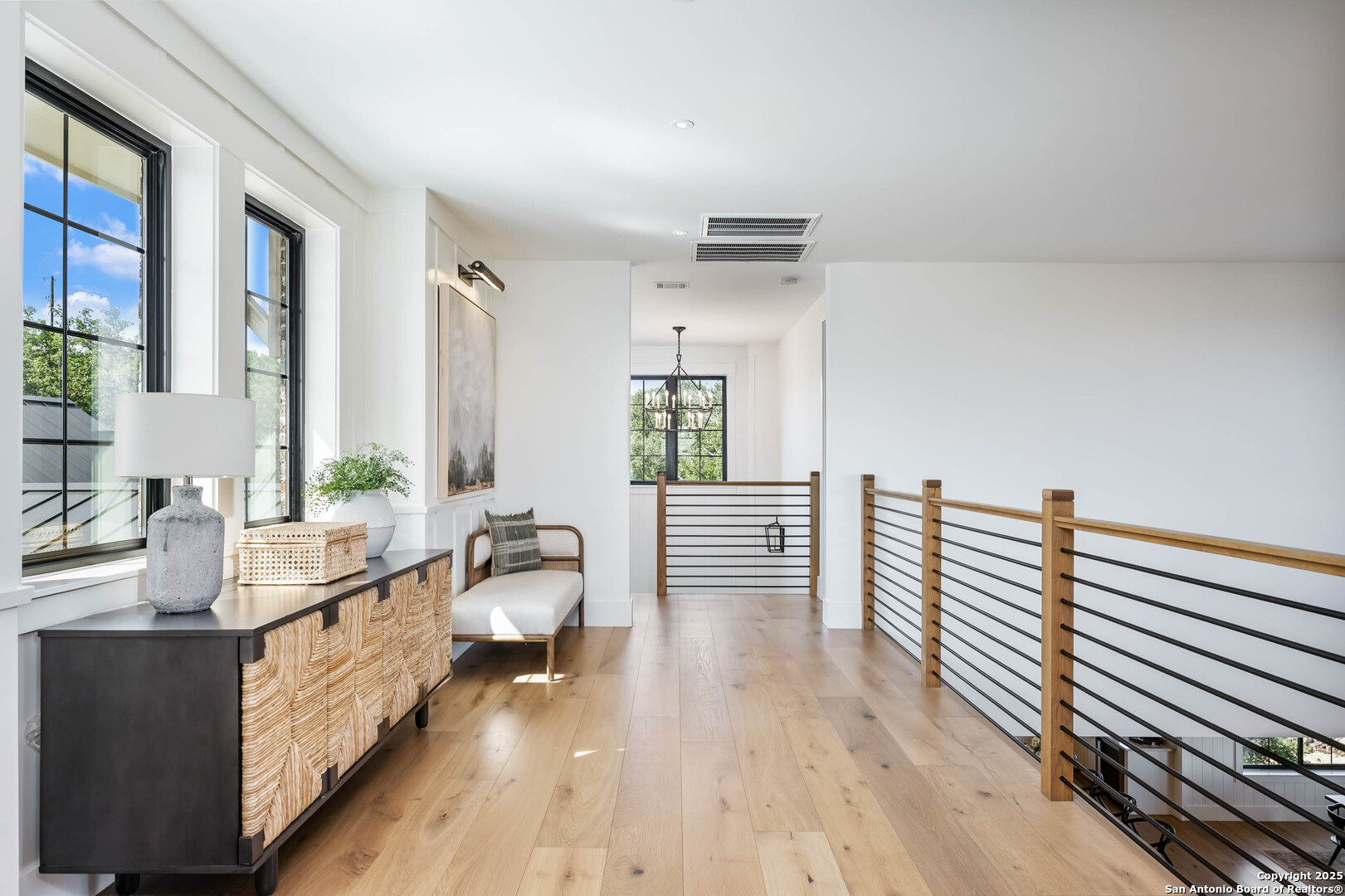 324 Ridge Point Spring Branch, TX 78070 - Photo 49 of 50 a bathroom with a double vanity sink and mirror
