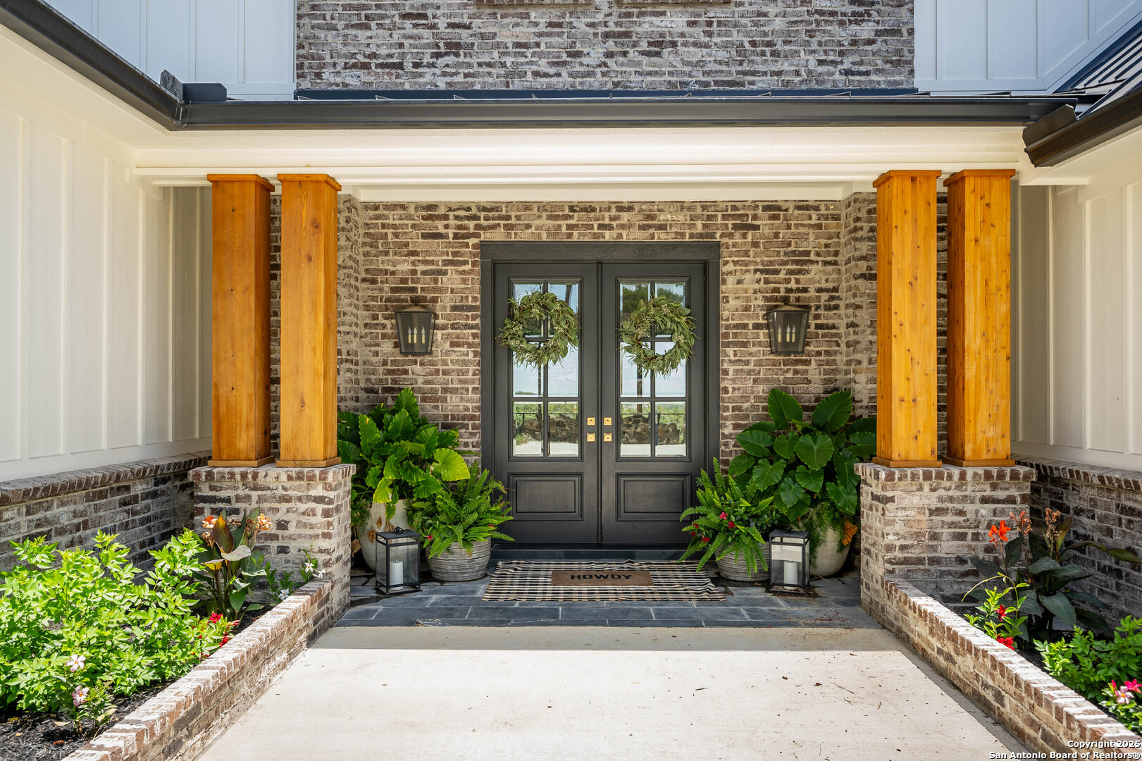 324 Ridge Point Spring Branch, TX 78070 - Photo 6 of 50 a front view of a house with a garden
