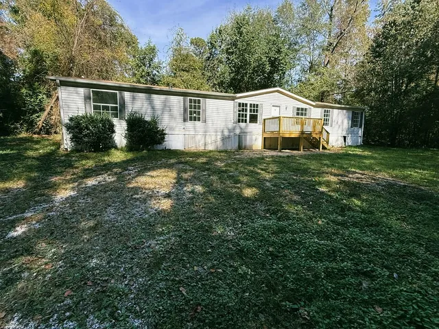 a house view with a garden space