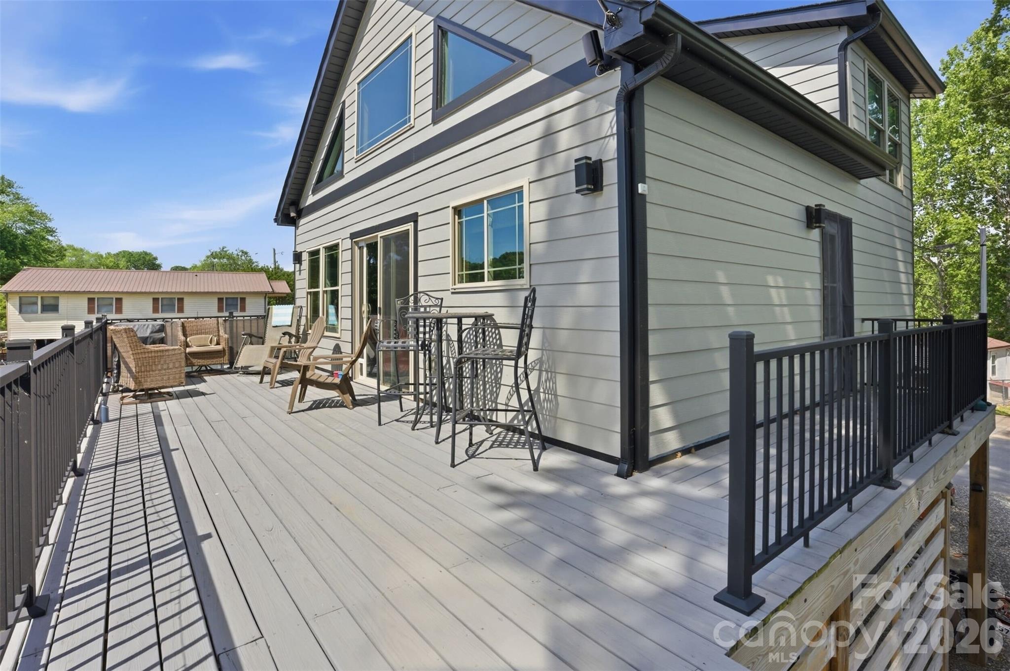 4473 Ridge Street Claremont, NC 28610 - Photo 16 of 26 a view of a house with a patio