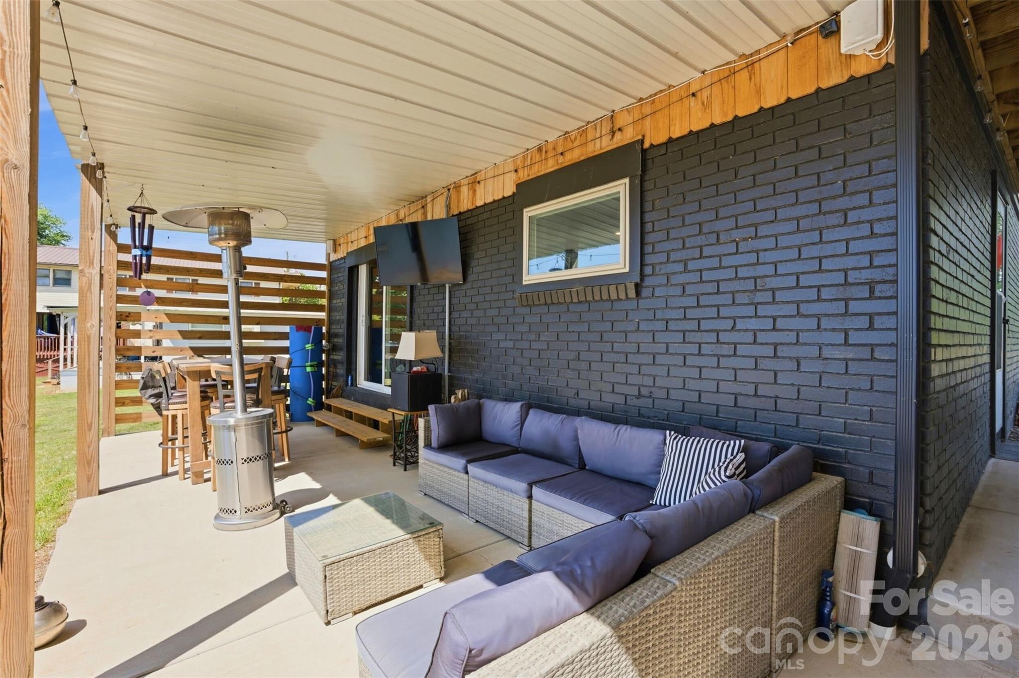 4473 Ridge Street Claremont, NC 28610 - Photo 24 of 26 a building outdoor space with patio furniture
